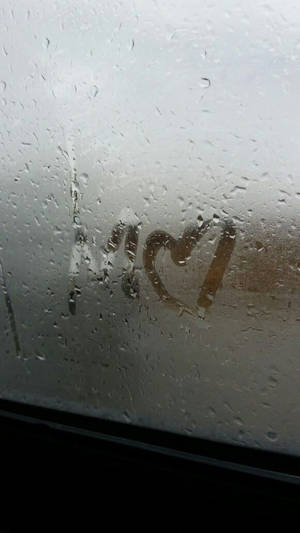 Foggy Window Letter M Wallpaper