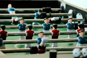 Foosball Table Game Action Wallpaper