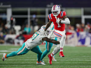 Football Action Catch Attempt Wallpaper