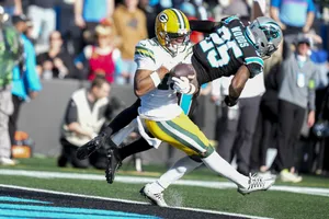 Football Action Catchand Tackle Wallpaper