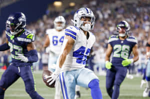 Football Action Dallasvs Seattle Wallpaper