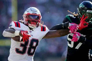 Football Action Patriots Player38 Stiff Arm Wallpaper