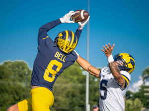 Football Catch Moment Ronnie Bell Wallpaper