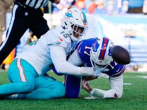 Football Defensive Tackle Action Wallpaper