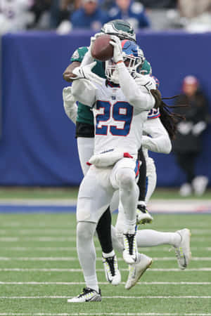 Football Interception Action Shot Wallpaper