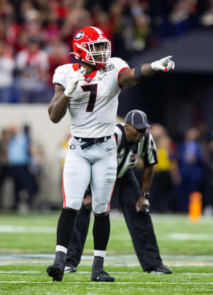 Football Linebacker Quay Walker Pointing On Field Wallpaper