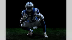 Football Linebacker Ready Stance Wallpaper
