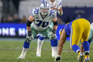 Football Lineman Ready Position Wallpaper