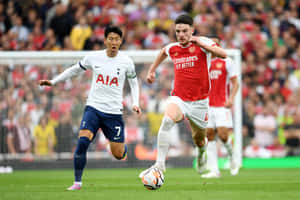 Football Match Action Arsenalvs Tottenham Wallpaper