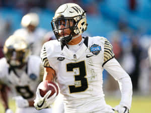Football Player Action Shot Belk Bowl Wallpaper
