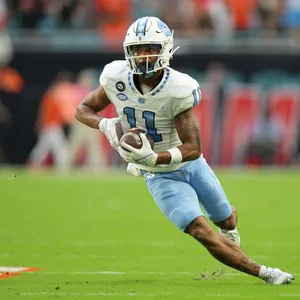 Football Player Action Shot Wallpaper