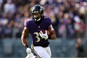 Football Player Action Shot Wallpaper