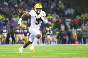 Football Player Action Shot Wallpaper