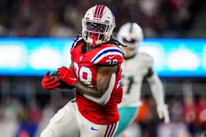 Football Player Action Shot Wallpaper