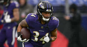 Football Player Action Shot Wallpaper