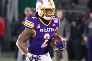 Football Player Action Shot Wallpaper