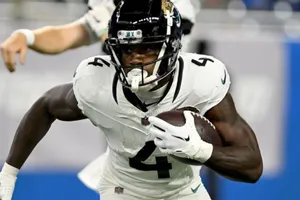 Football Player Action Shot Wallpaper