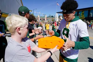 Football Player Autograph Session Wallpaper