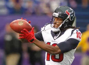 Football Player Catching Ball Wallpaper