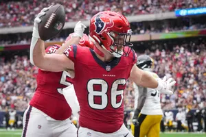 Football Player Catching Ball86 Wallpaper