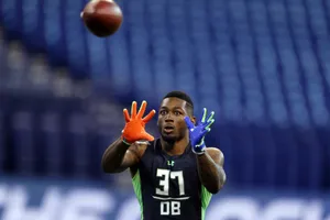 Football Player Catching Drill Wallpaper