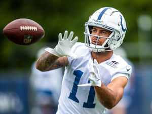 Football Player Catching Practice Wallpaper