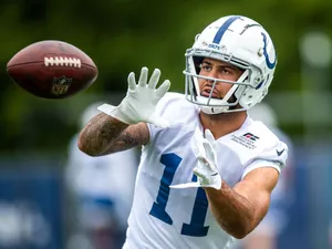 Football Player Catching Practice Wallpaper