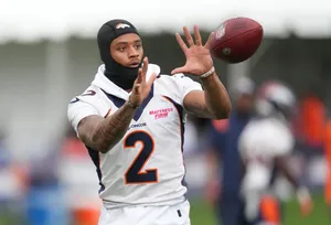 Football Player Catching Practice Wallpaper