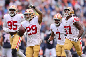 Football Player Celebrating Interception Wallpaper