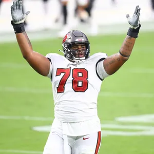 Football Player Celebrating On Field Wallpaper