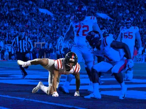 Football Player Celebrating Touchdown Wallpaper