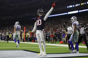 Football Player Celebrating Touchdown Wallpaper