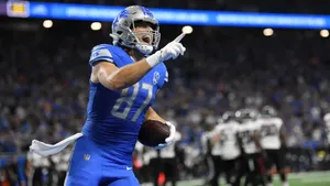 Football Player Celebrating Touchdown Wallpaper