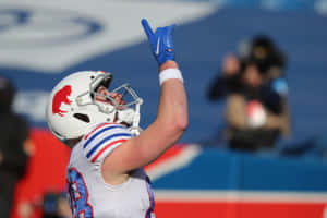 Football Player Celebrating Touchdown Wallpaper