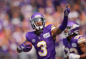 Football Player Celebrating Touchdown Wallpaper