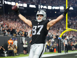 Football Player Celebrating Touchdown Wallpaper