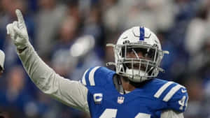 Football Player Celebrating Victory Wallpaper