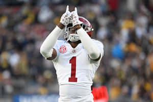 Football Player Celebrating Victory Wallpaper