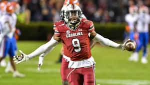 Football Player Celebrating Victory Wallpaper