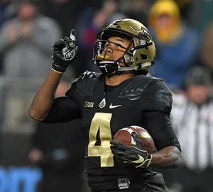 Football Player Celebrating Victory Number4 Wallpaper