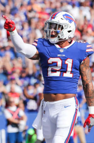 Football Player Celebratingon Field Wallpaper