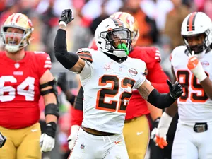 Football Player Celebratingon Field Wallpaper