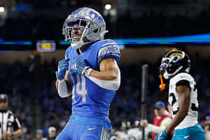 Football Player Celebration Blue Uniform Wallpaper