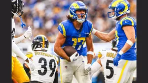 Football Player Celebration During Game Wallpaper