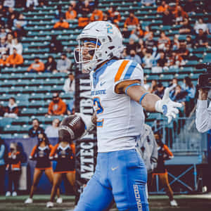 Football Player Celebration Moment Wallpaper