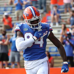 Football Player Celebration Number84 Wallpaper