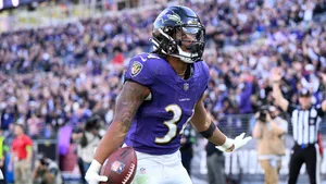 Football Player Celebrationat Stadium Wallpaper