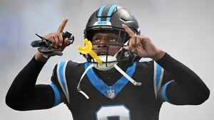 Football Player Celebratory Gesture Wallpaper