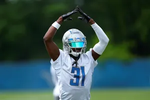 Football Player Celebratory Gesture Wallpaper