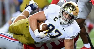 Football Player Diving Catch Wallpaper